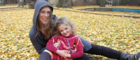 Woman holding daughter.